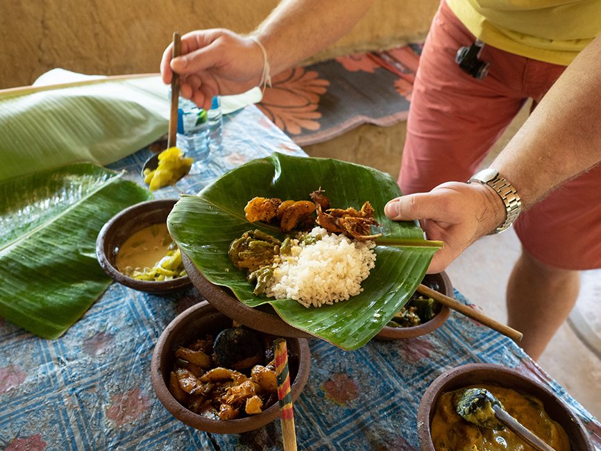 Sri Lankan rice and curry served on a banana leaf